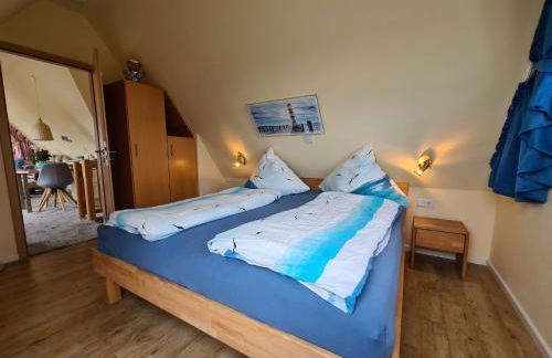 Ferienwohnung Inselblick Norddeich mit Meerblick - Foto 18