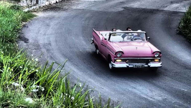 Enjoying the ride in a classic car