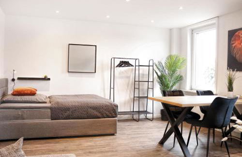 LIGHTPLACE • Größere Gruppen • 4 Einzelzimmer • Boxspring • Smart TV • Biergarten • Restaurant - Foto 1