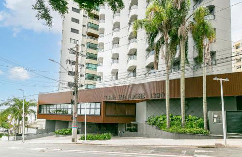 The Bridge by Viva - Prédio com piscina no terraço e academia em Floripa - Photo 1