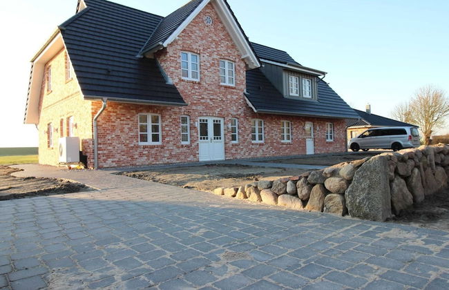 Doppelhaushalfte in Karolinenkoog - Foto 23