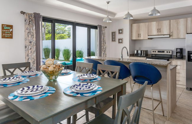 Ultramodern Townhome with an Inviting Coastal Design and Lush Outdoor Oasis with a Private Pool - Photo 14