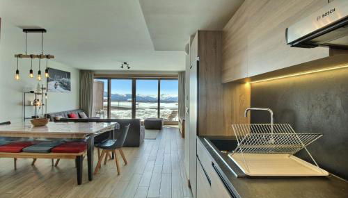 ARC 1600, LE RIDGE, Appartement 10 personnes Duplex Vue Montagne - ski aux pieds - Sauna, Hammam, Piscine, Salle de salle de sport-fitness - Foto 2, stove