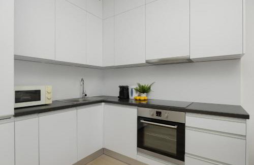 Stylish Apartment in Browary Warszawskie with Air Conditioning & Parking by Noclegi Renters - Foto 3