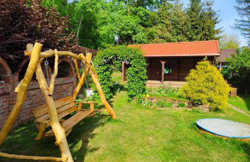 Leszczynowy domek nad jeziorem - Foto 16