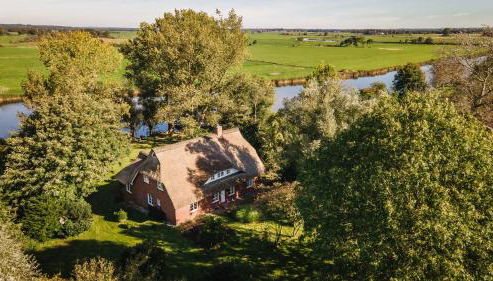 Reetdachhaus direkt am Wasser - Foto 5