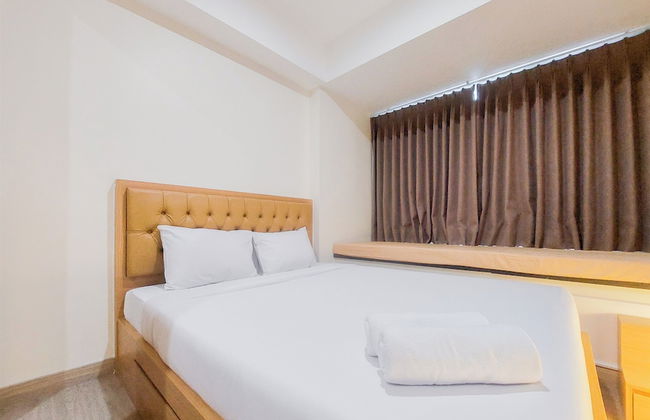 Homey And Cozy Living Studio At Collins Boulevard Apartment - Photo 1