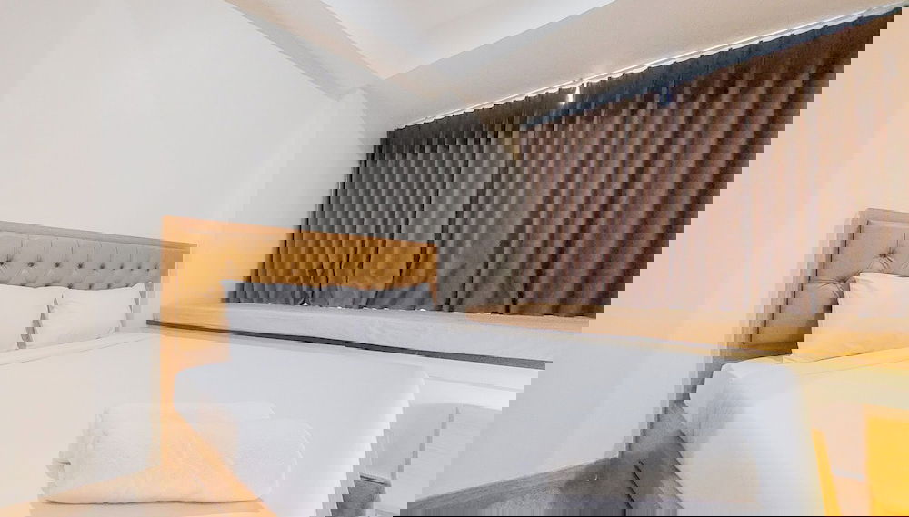 Homey And Cozy Living Studio At Collins Boulevard Apartment - Photo 1, Chambre