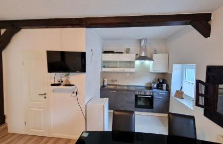 Schöne Einliegerwohnung im Fachwerkhaus - Foto 9