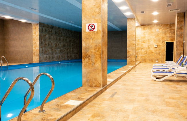 Spacious 1BR Pool & Sauna - Photo 9