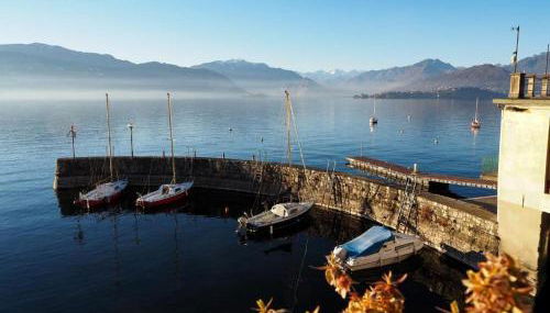 Romantic Attic Retreat with Panoramic Terrace, Steps from the Lake - Photo 4