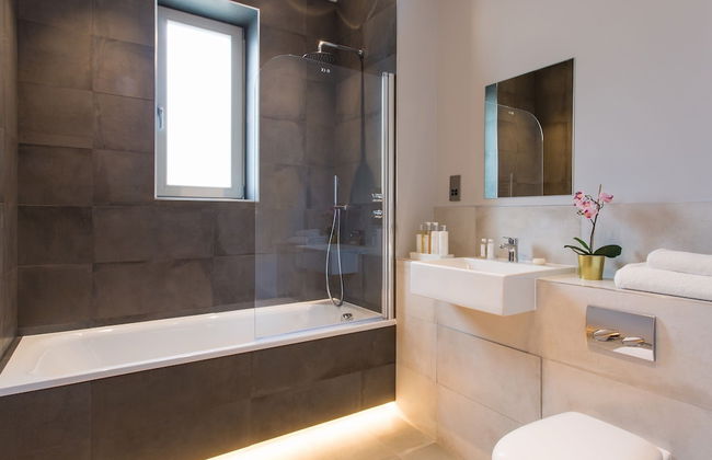 Boutique Apartments by Viridian Apartments - Photo 13