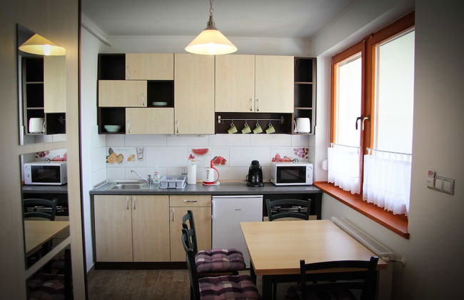 Oázis Apartmanok - Foto 10