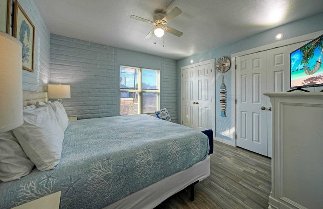 Beach Boardwalk Access Pool + Remodeled Interior Tropical Haven by Avantstay - Photo 27