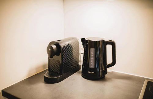 HUGOS Studio Apartment - Photo 18