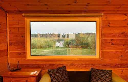 Domek nad jeziorem z własnym pomostem - Foto 8