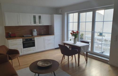 75m2 lichtdurchflutete 3 Zimmer Souterrain Wohnung in einem Neubau Villa - Foto 1