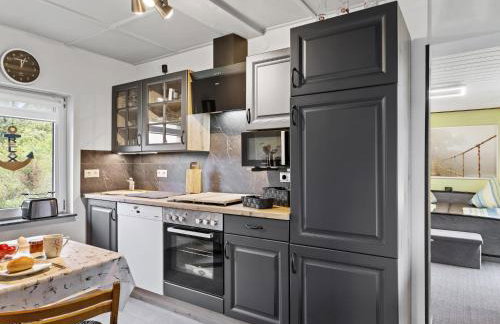 Nelsen mit Ruderboot auf Wassergrundstück - Photo 13