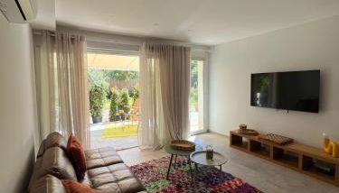 Rez-de-villa avec terrasse privative sur jardin - Photo 3