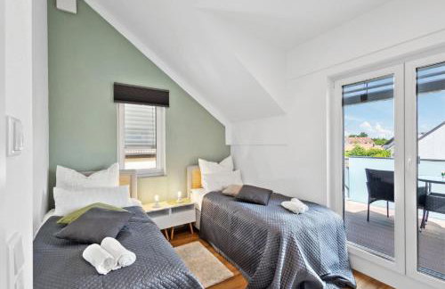 Harmonie Homes - Built in 2025 - High-Quality Beds & Linen - Full Kitchen - Fiber WiFi - 4K Smart TV - 2 Balconies - Elevator - Free Private Parking - Near Augsburg - 20 Min via Autobahn to Munich-West - Foto 33