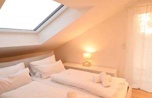 Liboria I Stylische Maisonette Wohnung Alpenblick I 4min zum See - Foto 3