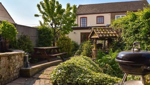 Honeysuckle Cottage - Foto 1