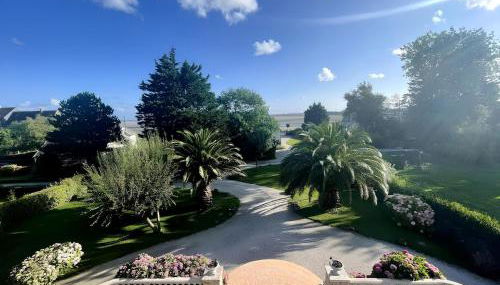 Duplex Bellevue, vue mer, à 50m de la plage! - Foto 4, Garden view
