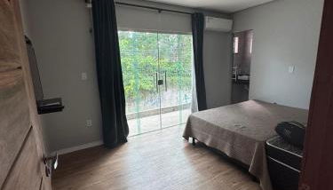 Casa com suítes e varandas com uma garagem - Foto 3