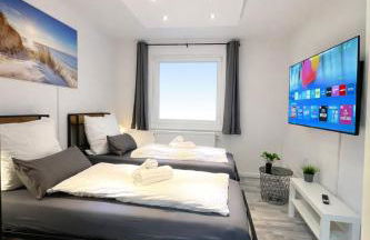 STN Kocherwald Suite - Ferienwohnung mit 4 Schlafzimmer, 8 Big Beds, Parkplatz & Balkon, Highspeed WLAN, Netflix Premium, Zentral zu Audi & Schwarz Gruppe - Foto 19