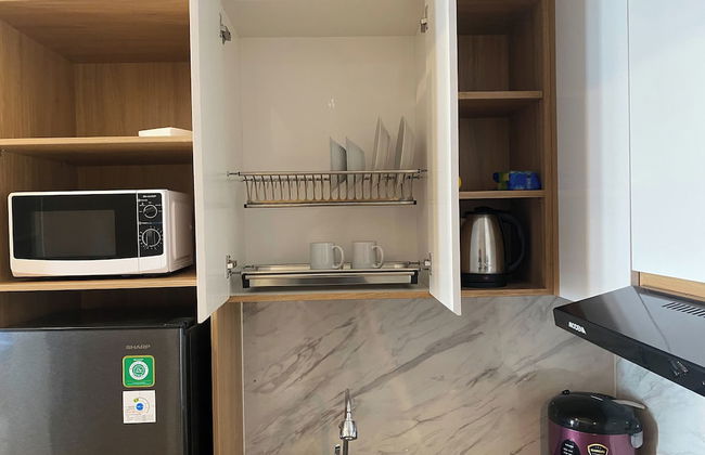 Spacious and Restful 1BR at Vasanta Innopark Apartment - Photo 9