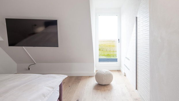 Exklusive Wohnung auf dem Deich an der Nordsee - Foto 2, Habitación