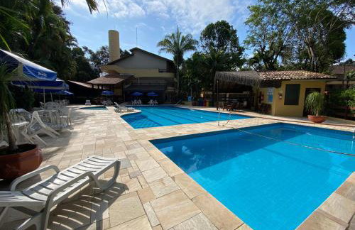 Fabuloso flat 241, Amarílis, Riviera de São Lourenço 3 Piscinas climatizadas carregador veiculo eletrico 2 quartos sendo uma suíte internet 500mb Adega, cozinha equipada completa, serviço de praia fim de semana limpeza trocas de toalhas, - Foto 66