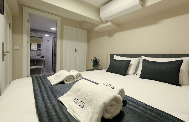 Moss Suites Hotel - Photo 8