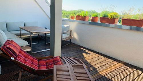 Exklusives Penthouse im ehemaligen Bunker - Foto 5, Garden view