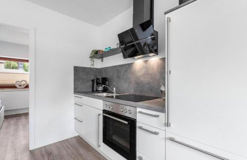 Fe Wo Koll - Photo 2