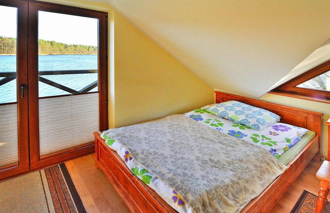 Holiday Home by Lake Rosnowskie With Boat - Photo 5