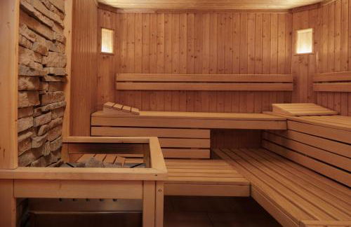 Aparthotel Familiaris - Family Apartments - Pools & Spa in Dolomites - Foto 44