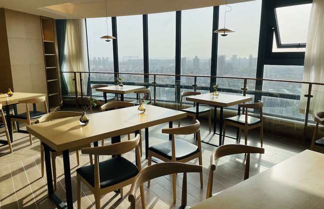 Joysuites Nantong - Foto 24