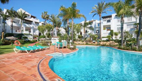 Luxury Beachfront Apartment with Pool in Costalita - Photo 2, Garden, sunbed