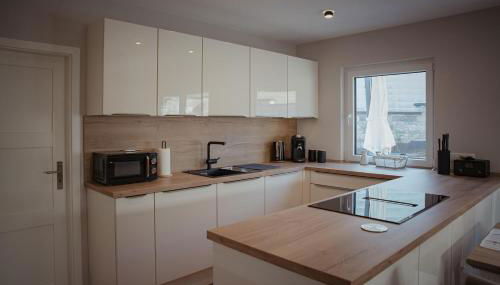 Ferienhaus Eifeltoni - Photo 5, stove