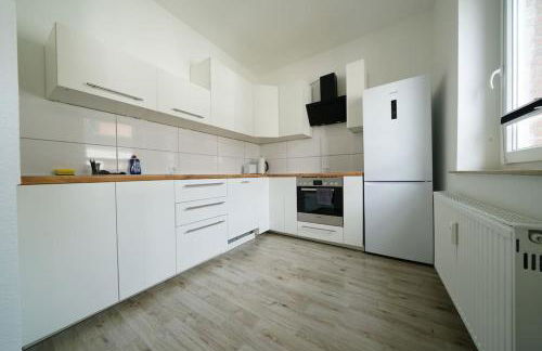 Schöne helle 50qm Suite mit großer Küche - Foto 13