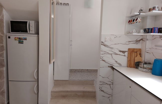 Homey 1-BR Apt - Photo 17