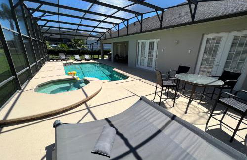 Magical Lakeview 4 Master Suites Pool Hot Tub BBQ Home Theater 2 Miles Disney - Foto 41