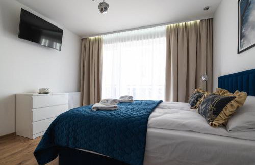 SOLEK, Apartamenty hotelowe i pokoje gościnne ze śniadaniem, przyjazne zwierzętom, wyjątkowe, z widokiem na Jezioro Jamno i w bardzo bliskiej odległości od morza - Foto 61