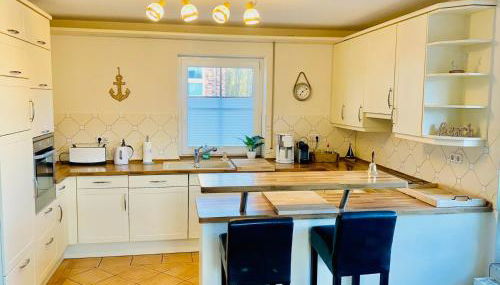 FeWo SONNENDECK Familien-strandnah-Garten-Hunde-Sport-und Schwimmbadnah-HansaPark - Foto 5, stove, dishwasher, pet friendly, toaster, minibar