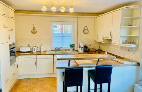 FeWo SONNENDECK Familien-strandnah-Garten-Hunde-Sport-und Schwimmbadnah-HansaPark - Foto 5