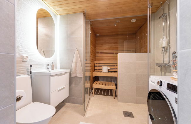 Historical 1BR Penthouse with Sauna - Photo 13