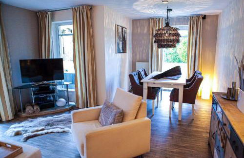 Liebevoll eingerichtete Wohnung mit Terrasse - Foto 2