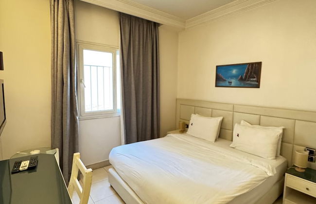 NY Suites Hotel - Photo 10