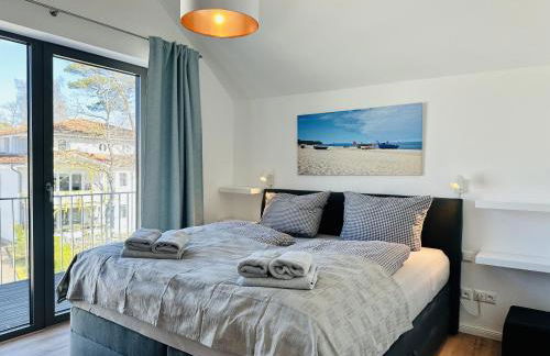 Ferienwohnung Sonnendeck Parkvillen Carlota und Candela Baabe - Photo 11